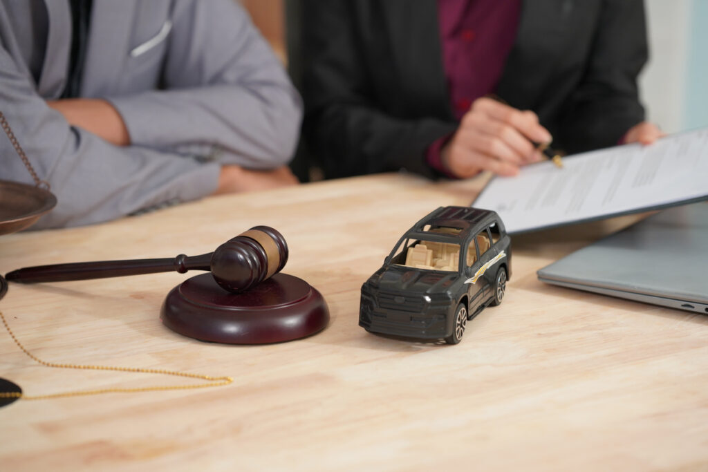 Judge gavel and car model lemon law